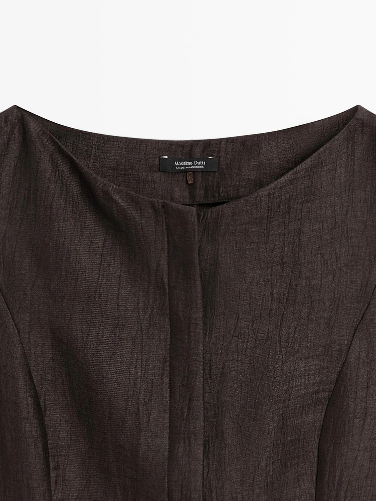Veste sans manches col rond en lin mélangé