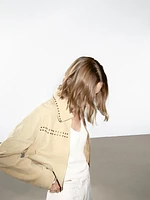 Short leather jacket with stud details