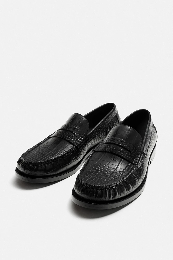 EMBOSSED LOAFERS