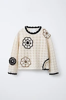 PULL EN CROCHET À FLEURS