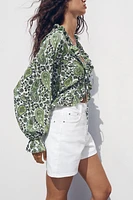 RUFFLED V-NECK TOP