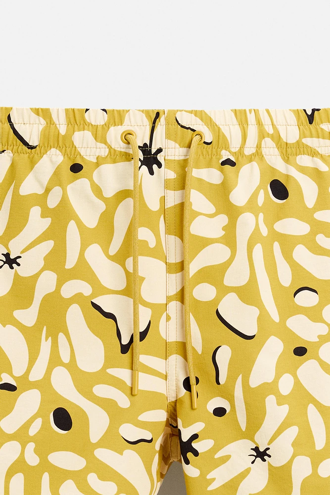 FLORAL PRINT REGULAR SWIM SHORTS