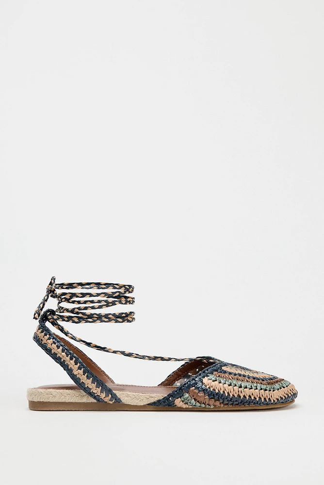 CHAUSSURES PLATES TRESSÉES