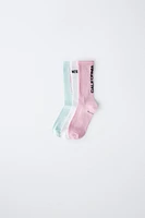 THREE-PACK OF TEXT PRINT LONG SOCKS