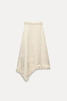 ASYMMETRIC FRINGE SKIRT