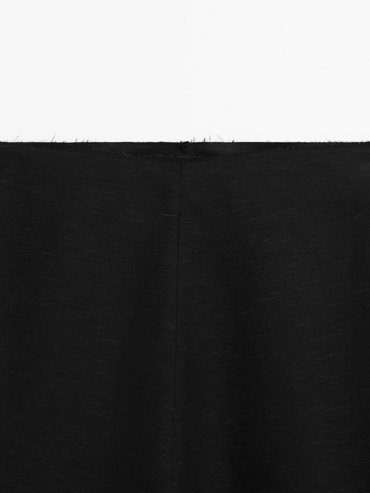 Midi skirt with topstitching detail on the hem