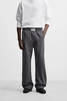 PATCH INTERLOCK PANTS