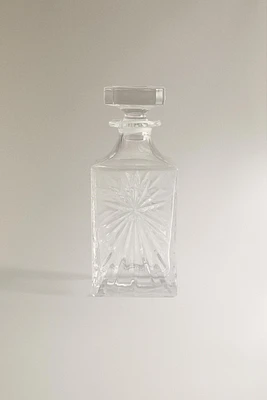 CRYSTALLINE BOTTLE WITH RAISED DESIGN