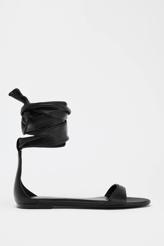 FLAT LEATHER STRAPPY SANDALS