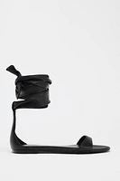 FLAT LEATHER STRAPPY SANDALS