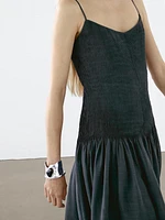 Long flounce dress with pintucks