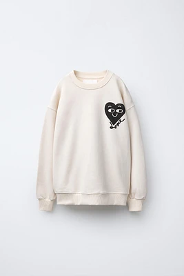 HEART PRINT SWEATSHIRT