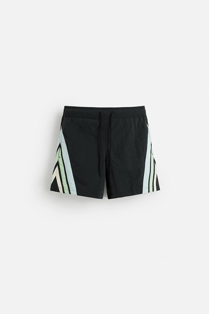 CONTRAST BANDS MID-LENGTH SWIMSUIT