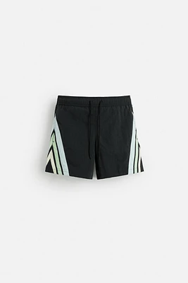 CONTRAST BANDS MID-LENGTH SWIMSUIT