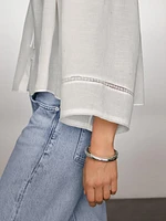 Flowing blouse with lace detail