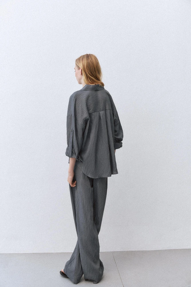 PANTALON LARGE À RAYURES