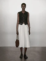 Knit vest with embroidered detail