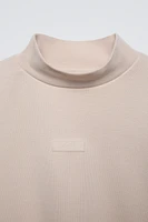 MOCK NECK SWEATSHIRT