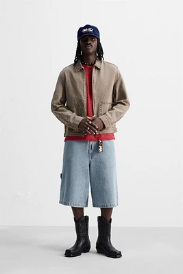 VESTE DÉLAVÉE CLOUS