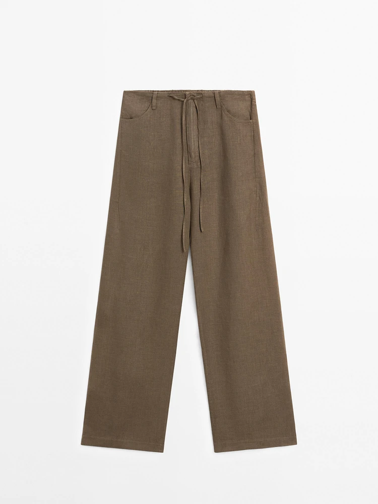 100% linen straight-leg trousers with pockets