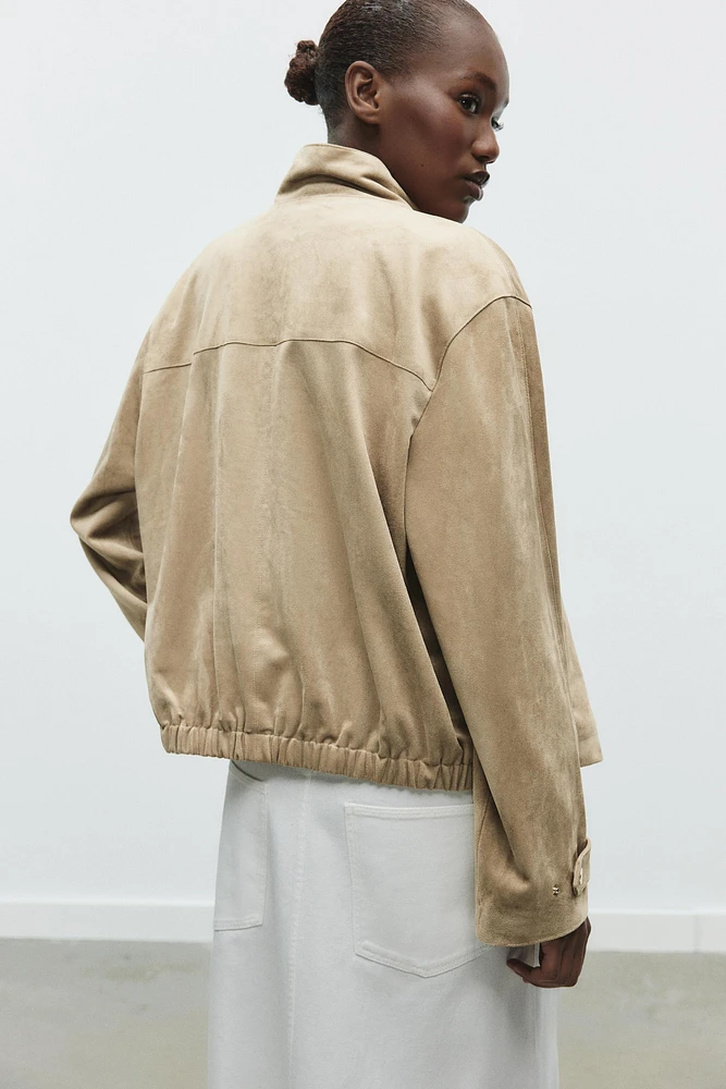 BLOUSON EN MATIÈRE SYNTHÉTIQUE