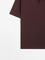 Textured knit short sleeve polo shirt