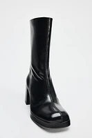 PLATFORM HEELED ANKLE BOOTS