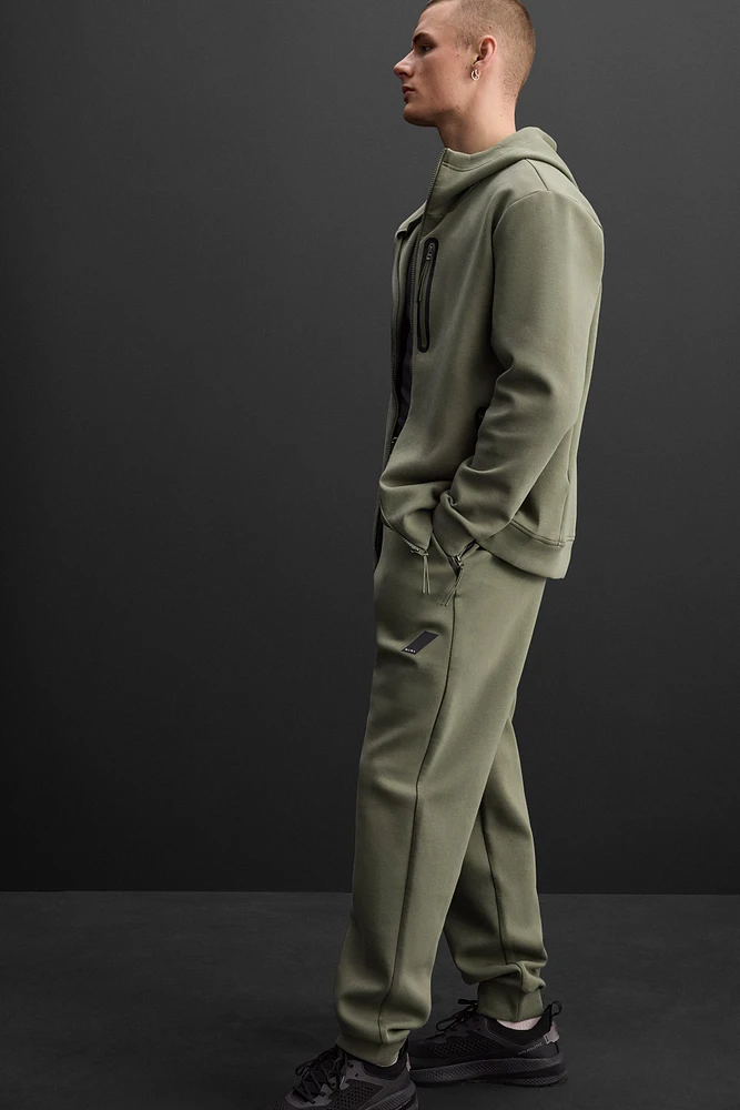 PANTALON DE JOGGING TECHNIQUE À ZIPS