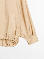 Veste bomber fluide avec cordon