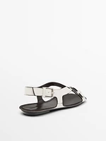 Sandales plates cuir boucles