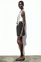 BELTED COMBINATION SHORT JUMPSUIT