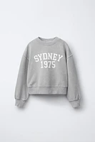 WASHED EFFECT TEXT SWEATSHIRT