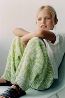 PLEATED PRINTED PANTS