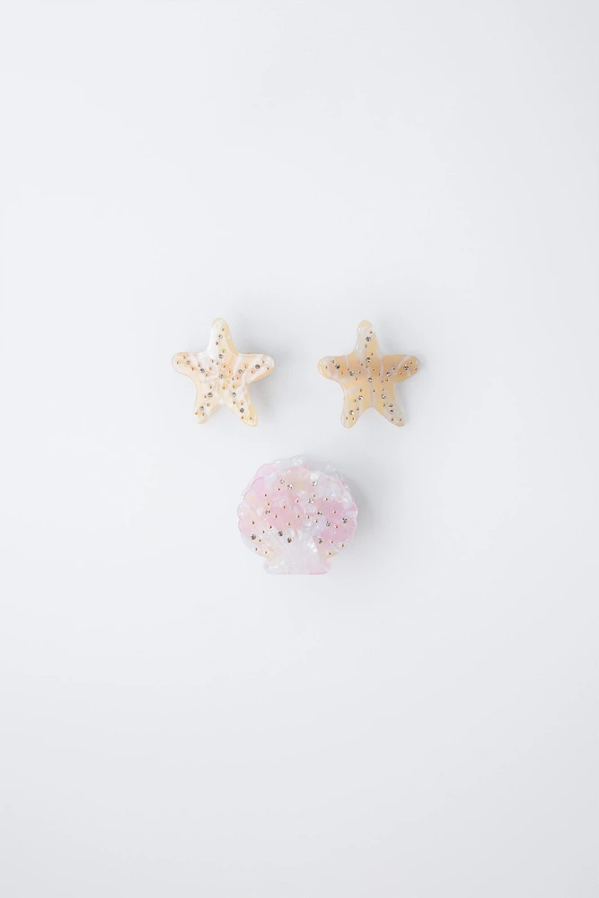 LOT DE TROIS PINCES COQUILLAGE ET ÉTOILES