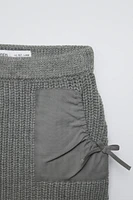 KNIT SKIRT WITH COMBINATION POCKETS