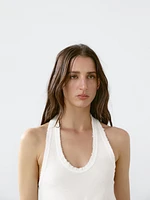 Top slim à encolure américaine effiloché