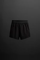 SHORT RUNNING SHORTS