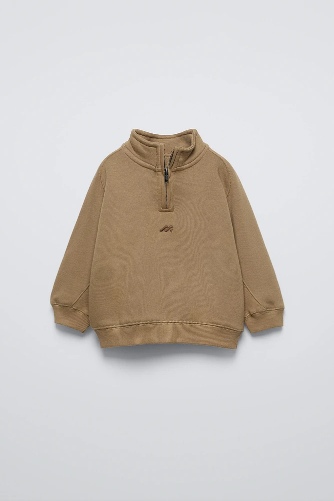 ZIP SWEATSHIRT