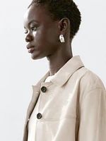 Veste courte à surpiqûres en cuir finition daim