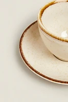 PORCELAIN TEACUP WITH ANTIQUE FINISH RIM