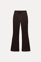 PANTALON FLARE INTERLOCK COUTURES