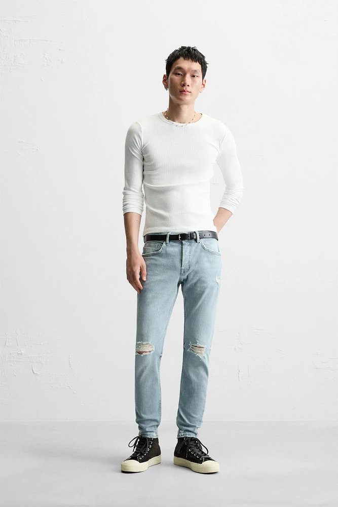 RIPPED SKINNY JEANS