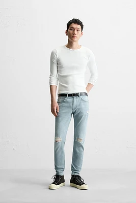 RIPPED SKINNY JEANS