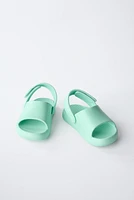 RUBBERIZED SLIDES