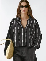 Blouse with embroidered details