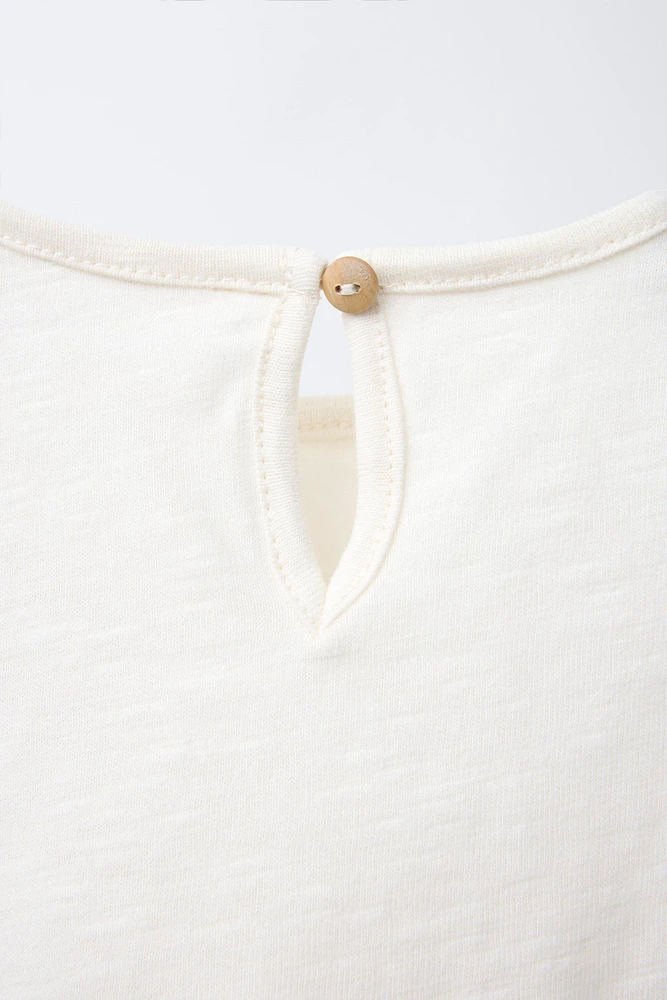 T-SHIRT APPLIQUÉ FLEUR