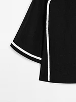 Blouse with contrast embroidery