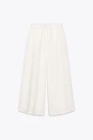 PLEATED WIDE LEG PANTS