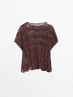 Cape en maille ajourée crochetée
