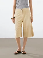 Bermuda long en cuir finition daim